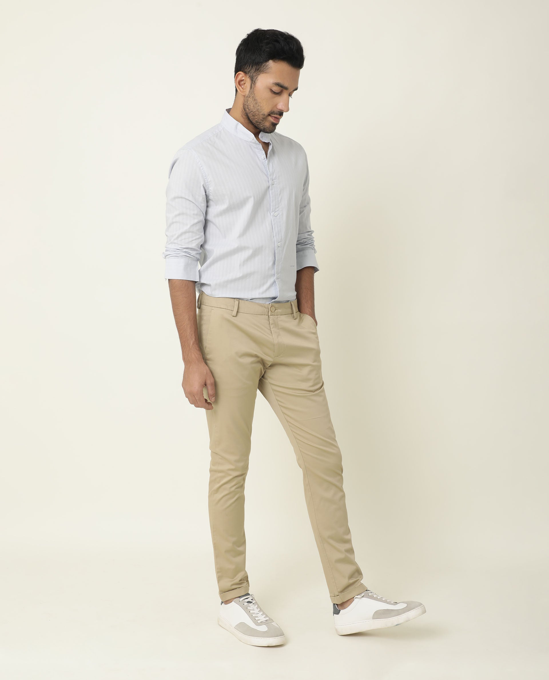 Buy Arrow Sports Men Light Beige Bronson Slim Fit Solid Casual Trousers -  NNNOW.com